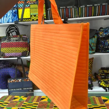 Side View Solid Orange Quilted Tote Bag in Lagos Nigeria, from African Things