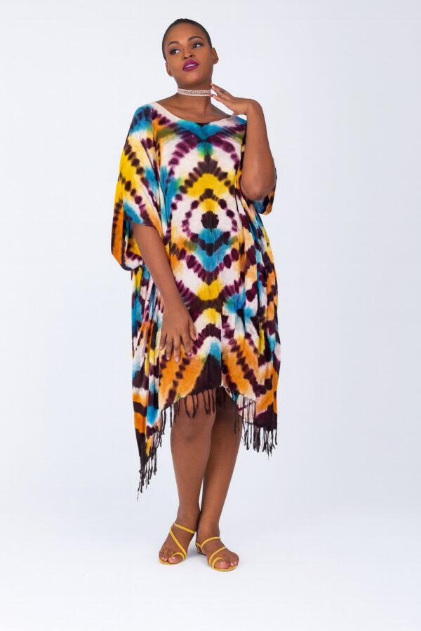 Adire print dress with fringe on a Nigerian model