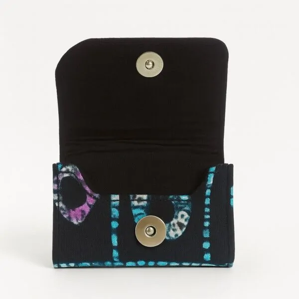 Open Ankara African print card holder with blue and purple dotted pattern, showing compartments.