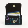 Ankara African print card holder with blue dotted patterns, open with credit cards inside.