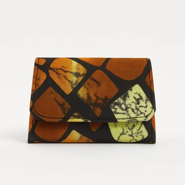 Ankara African print card holder with brown and yellow abstract patterns, closed front view.