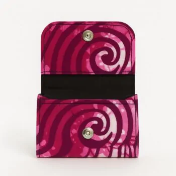 Open Ankara African print card holder with pink swirl patterns and snap button closure.