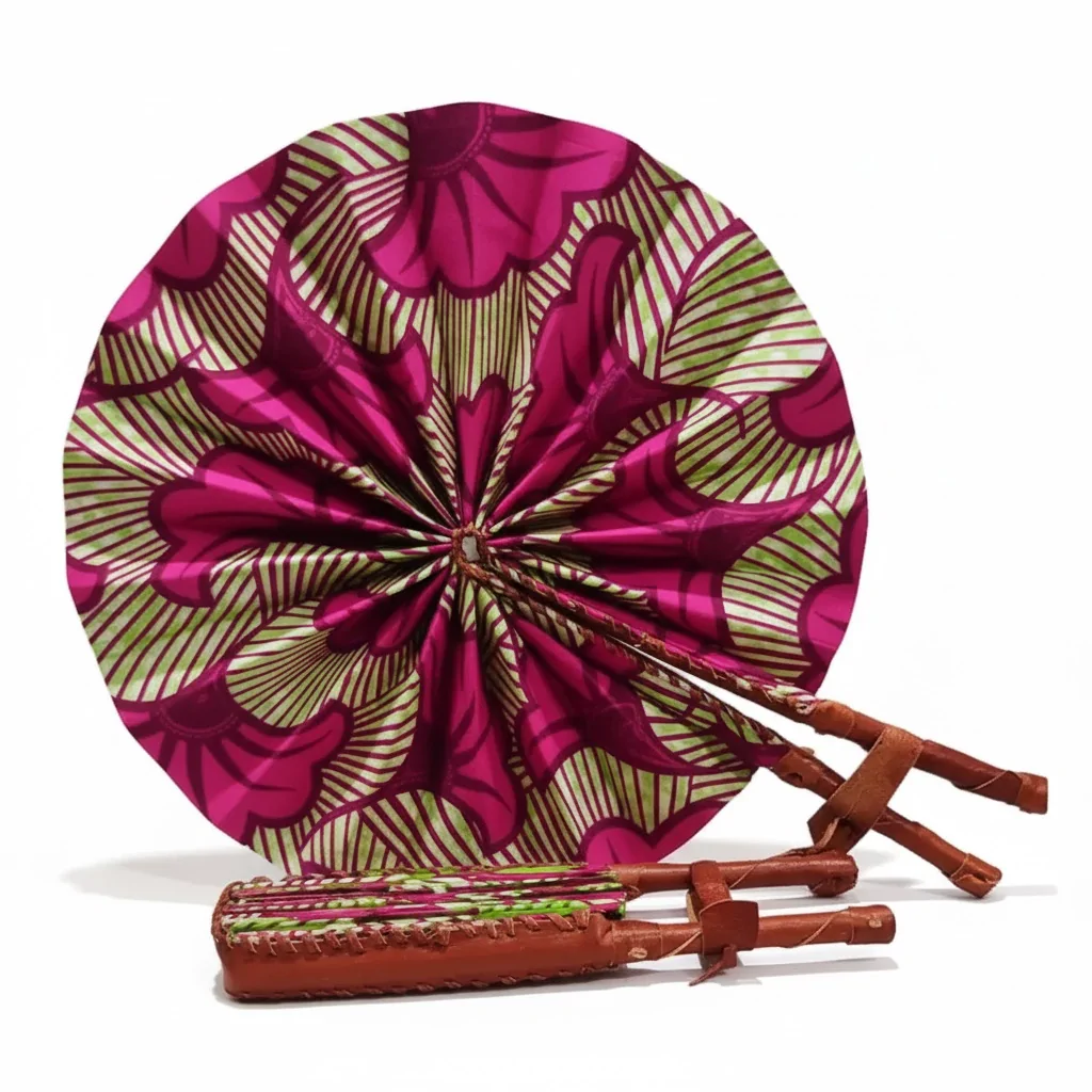 An Ankara fan displayed elegantly with its matching holder