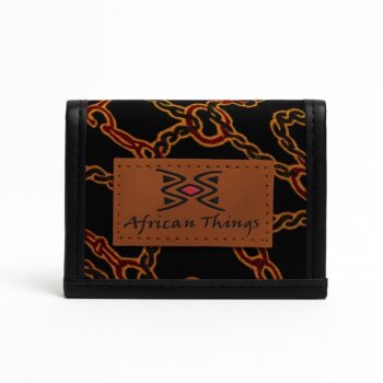 African print black wallet with gold chain-like patterns and brown African Things logo patch.
