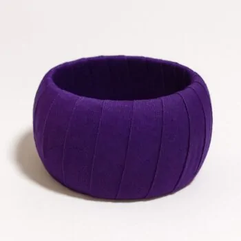 Solid purple Ankara fabric bangle with subtle pleated detail, displayed on a neutral background.