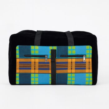 Front view of a collapsible duffel bag with bold African Ankara print in blue, orange, and green checkered patterns, dual front zip pockets, and black canvas base with short black handles. Studio white background.