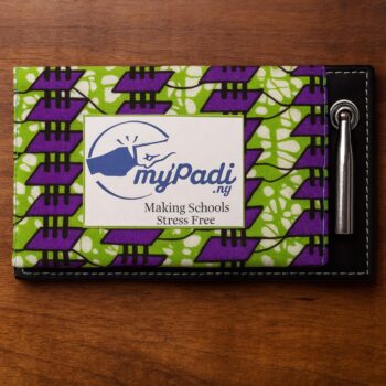 Custom ankara fabric desk organizer with MyPadi branding, pen holder, and stitched black leather edge