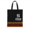 Black tote bag with "African Things" logo and Ankara fabric strip at the base