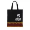 Black tote bag with "African Things" logo and Ankara fabric strip at the base