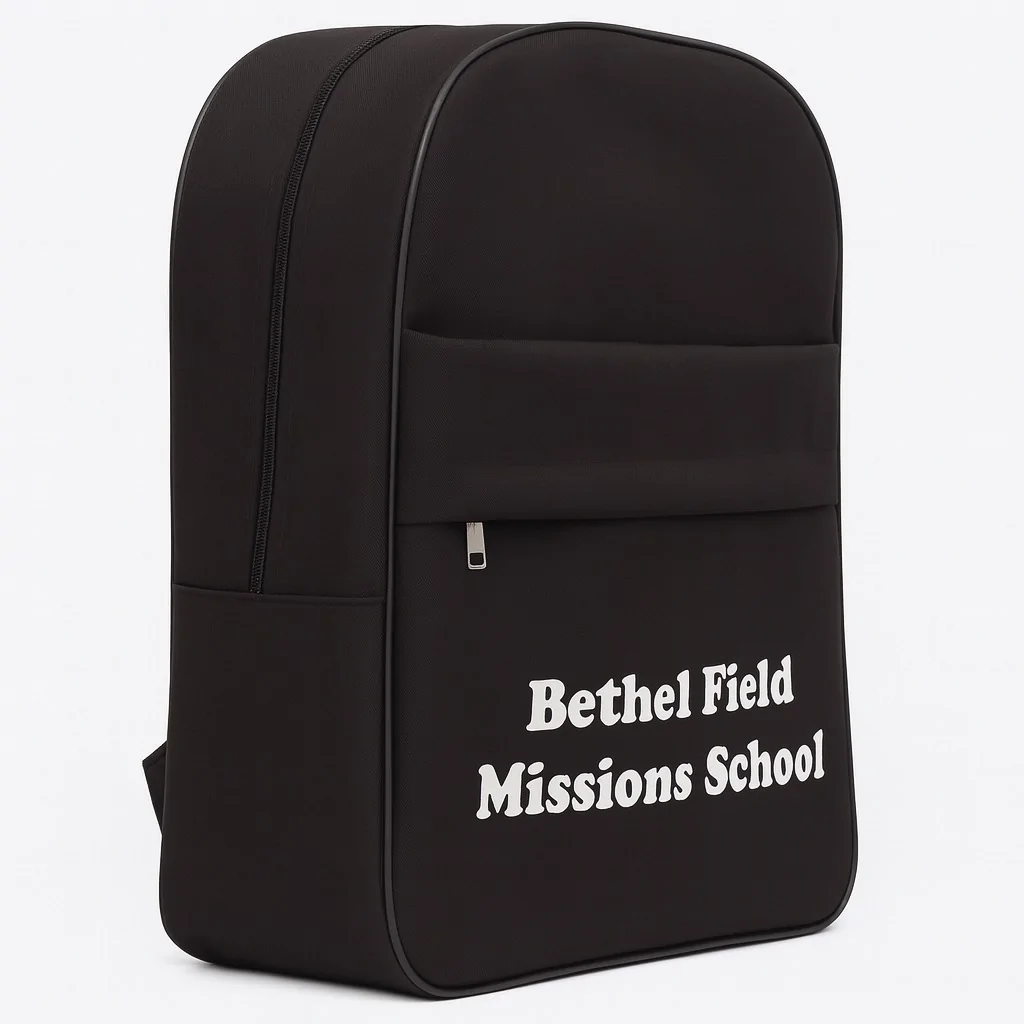 Side-angled view of the black school backpack with "Bethel Field Missions School" branding and zippered front pocket.