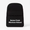Black school backpack with "Bethel Field Missions School" text printed on the front pocket.