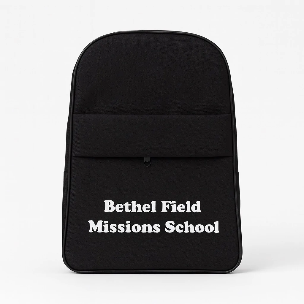 Black school backpack with "Bethel Field Missions School" text printed on the front pocket.