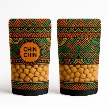 African print patterned pouch – colorful geometric tribal design in orange, green, and black, stand-up pouch with wide transparent section displaying Chin Chin snacks.