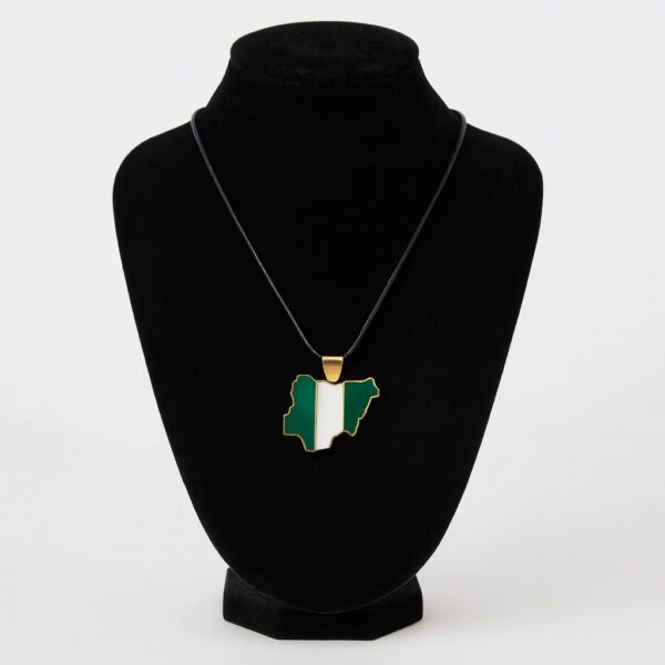 Nigeria map-shaped pendant necklace with black cord displayed on a black velvet jewelry stand.