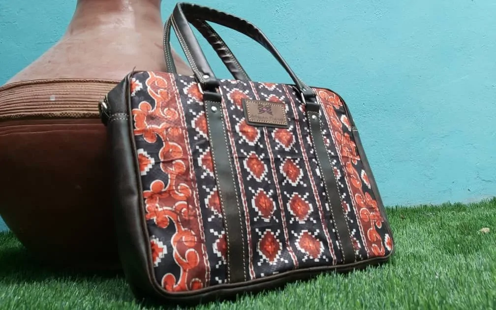 Handmade Souvenir Bags in Nigeria | Unique + Personalized 10 Leather and African print laptop bag.