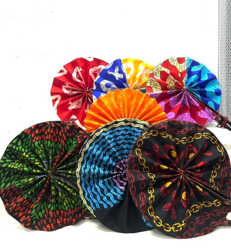 Ankara foldable handfans from African Things in Lagos, Nigeria, perfect for cheap burial souvenirs