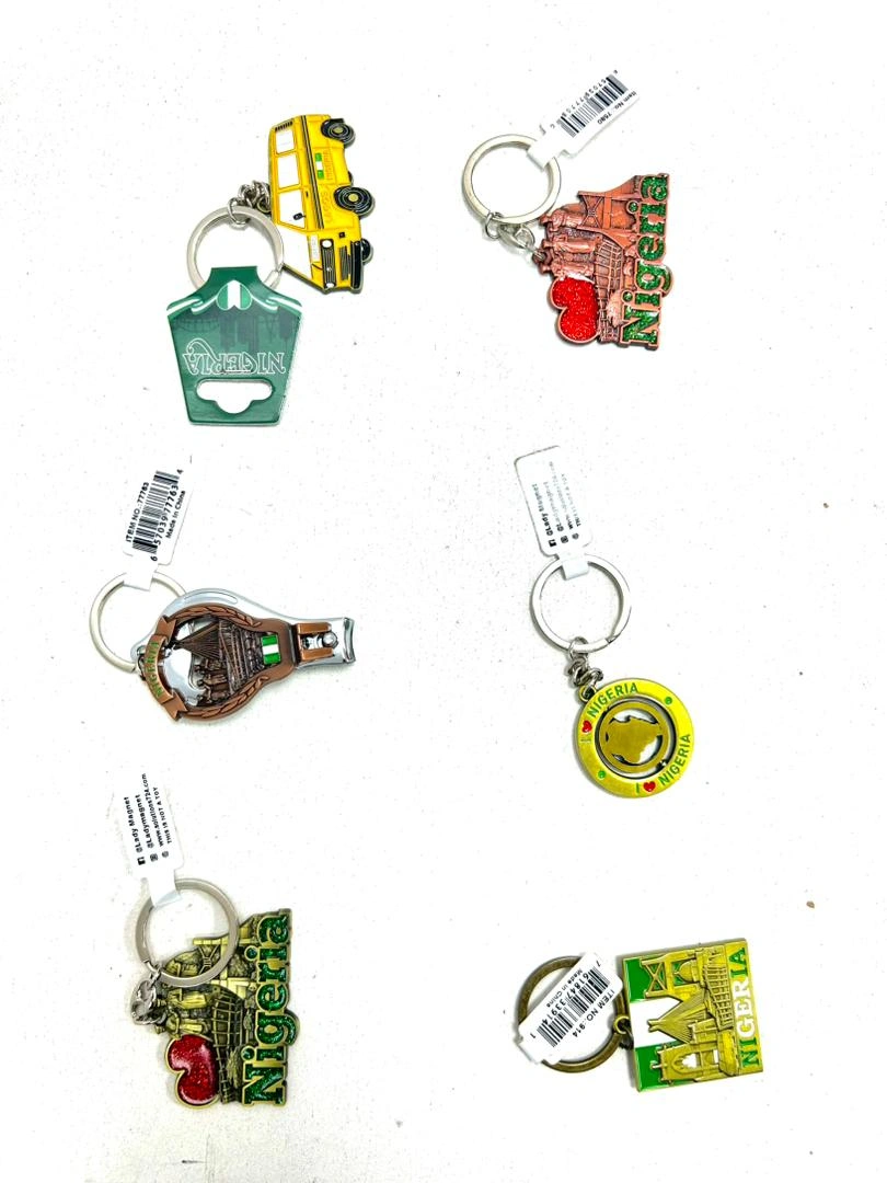 Cheap souvenir items collection including Keychains and Nail clippers