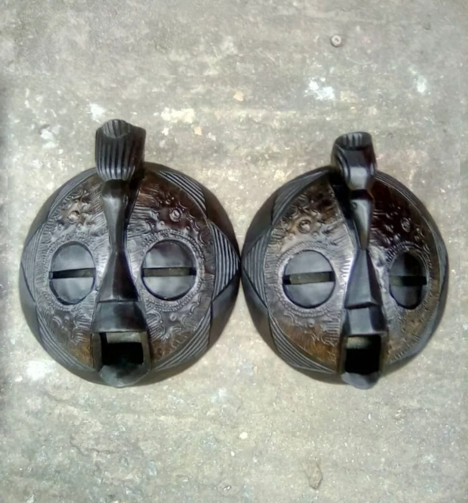 Two peace of traditional African artworks, perfect for African souvenir ideas.