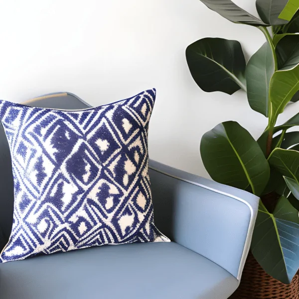 Adire Throw Pillow with vibrant colorful patterns.