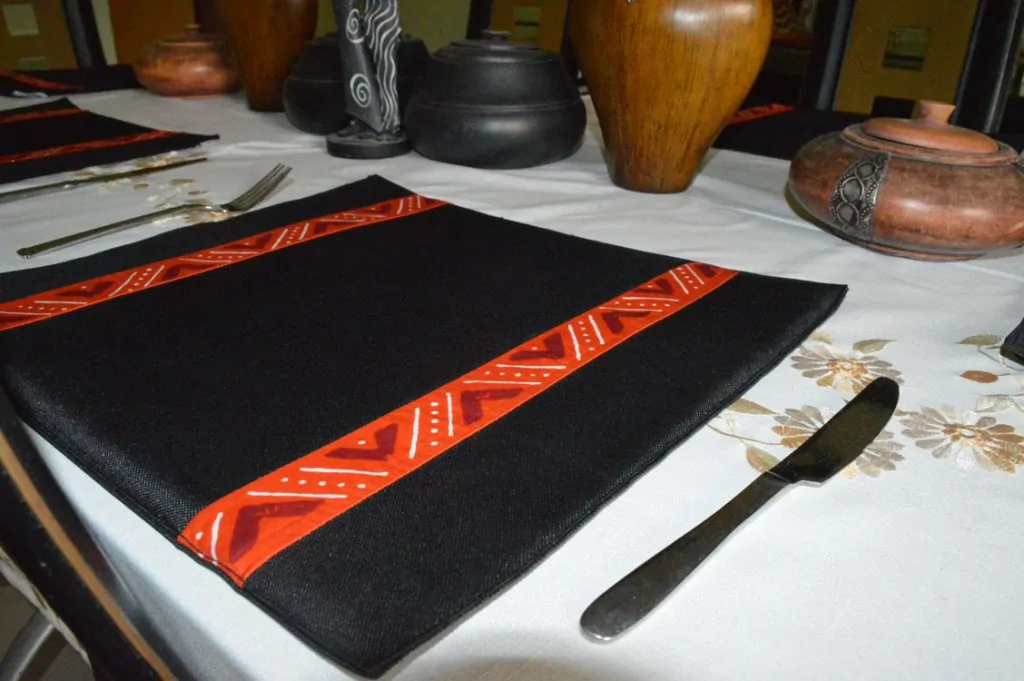 A table with African themed home décor.