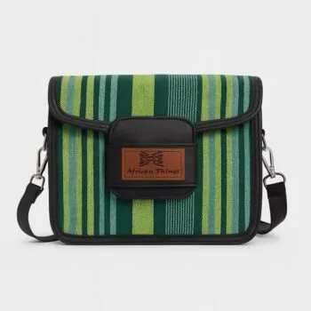 Front-facing image of a green-striped Aso Oke side bag with the "African Things" brown leather brand patch on the flap.