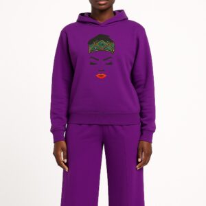 Model wearing a purple African print hoodie and pants set.