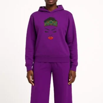 Model wearing a purple African print hoodie and pants set.