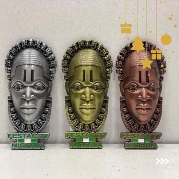 Three African masks in different colors