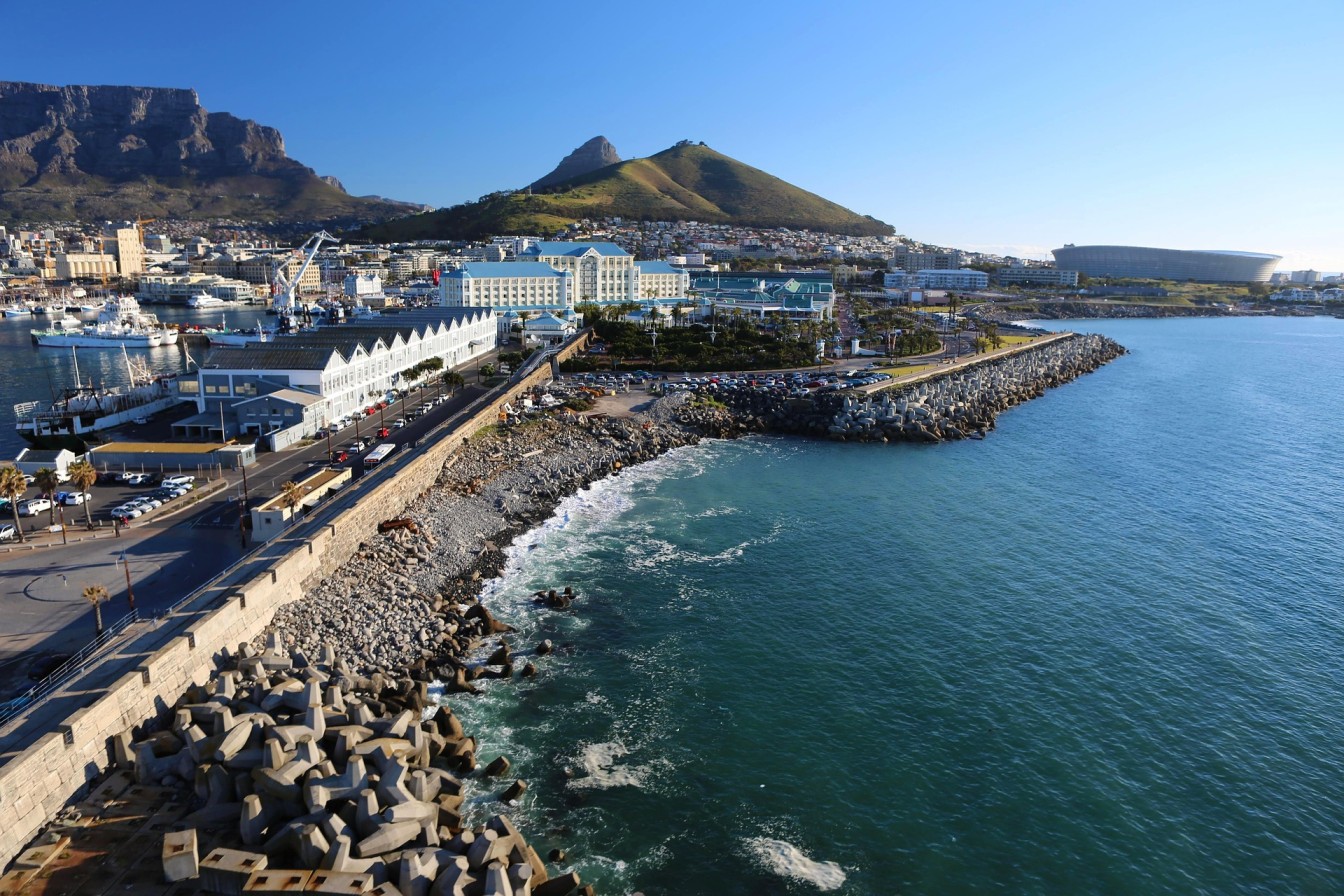 Aerial view of Cape Town's V&A Waterfront, a vibrant city for young professionals in Africa.