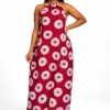 Backless halter neck dress with a red and white circular pattern