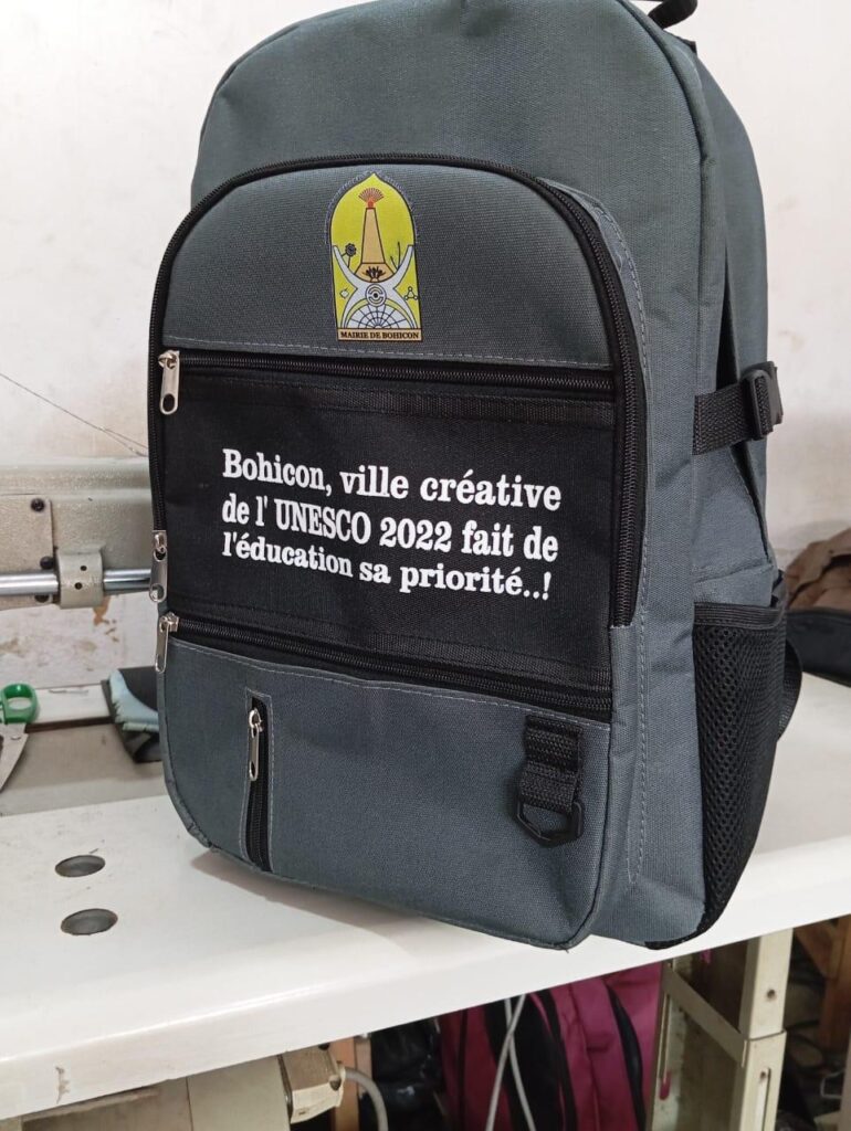 Custom branded standard school backpacks for NGOs and corporate gifting 