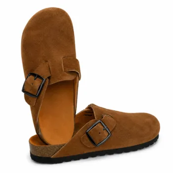 Pair of handmade men's minimalist tan suede open-back clogs showcasing a clean, buckle-free design, a tan leather footbed insert, and a thick black rubber outsole.