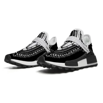 Black and white Dashiki African print mid-top sneakers with cushioned sole.