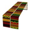 Green and orange Kente African print faux linen table runner with geometric pattern