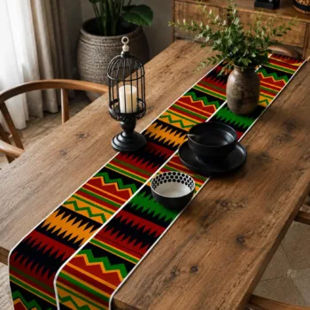 Green and orange Kente African print faux linen table runner with geometric pattern