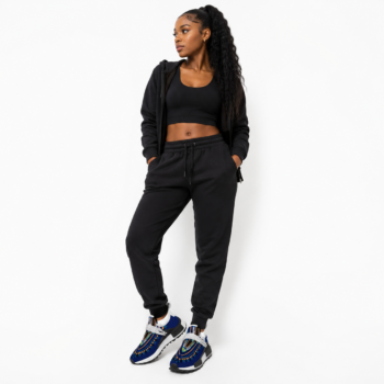 Model wearing Dashiki African Print Sneakers _ Unisex Mid-Top Shoes _ Afrocentric Breathable Trainers _ Non-Slip Walking Shoes