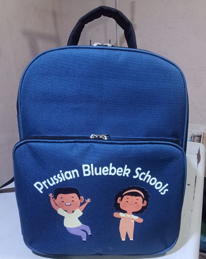 See how African Things produced 123 branded backpacks and lunch boxes for Prussian Bluebek Schools. Bulk school bag and lunch box manufacturing for schools in Nigeria.