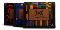 Set of three African print African Things wallets in red, blue star, and multicolor kente patterns.